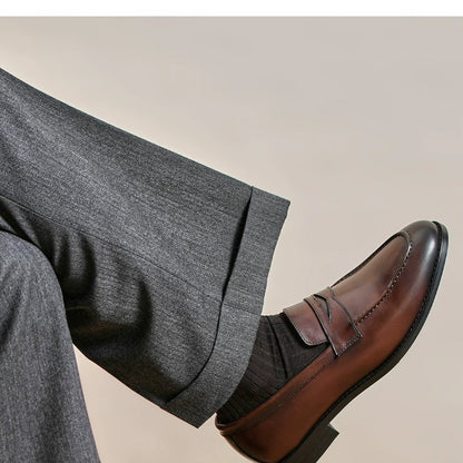 Lunepebbla waxed calfskin penny loafers sole view showing rubber outsole and Blake stitch