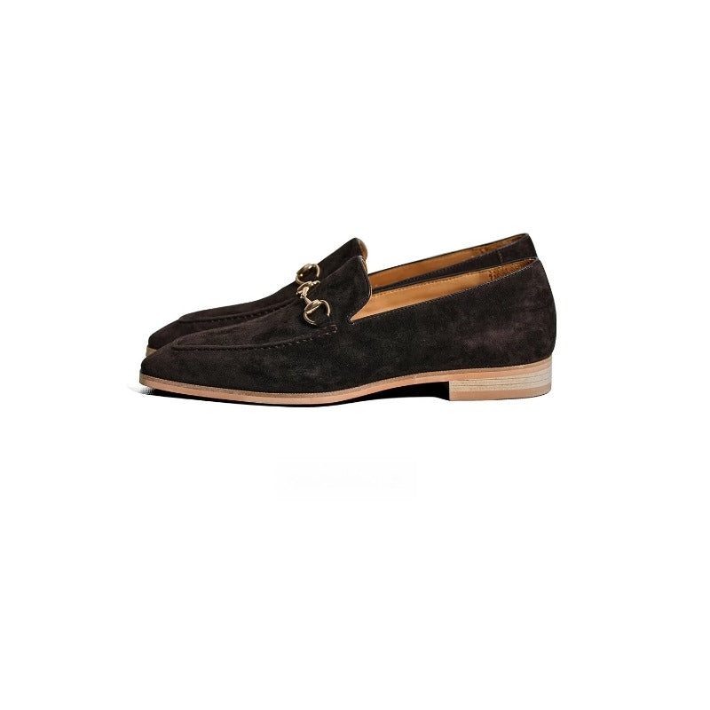 Lunepebbla close-up of gold-tone horsebit hardware on lambskin suede vamp