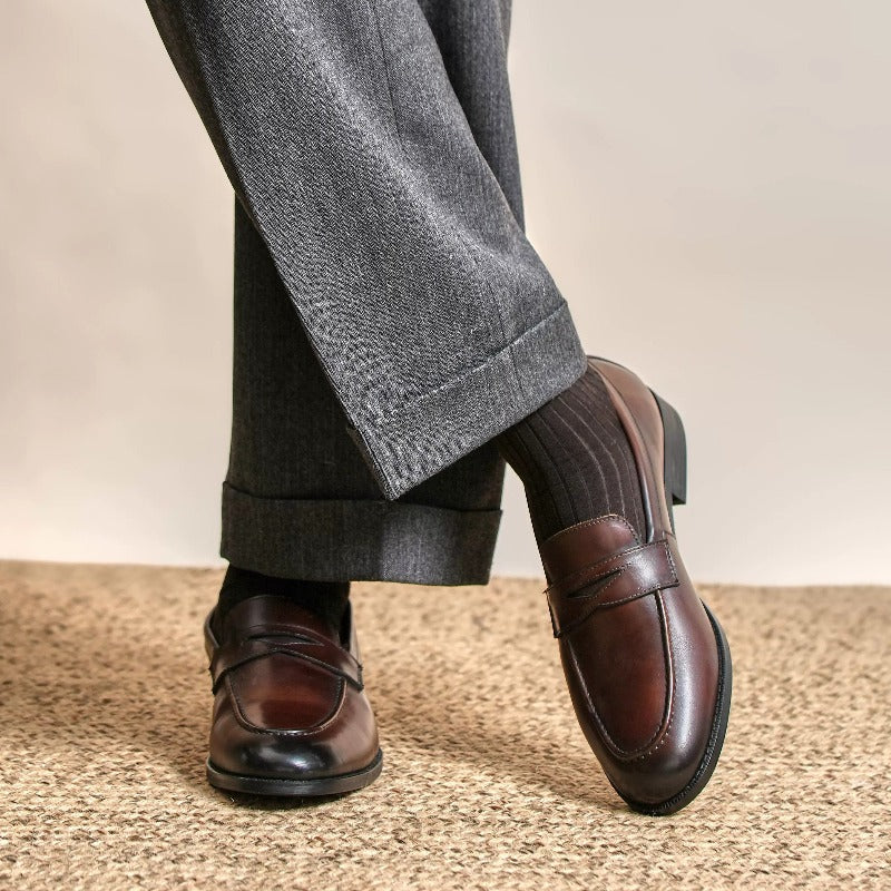 Lunepebbla brown waxed calfskin penny loafers close-up showing burnished toe gradient
