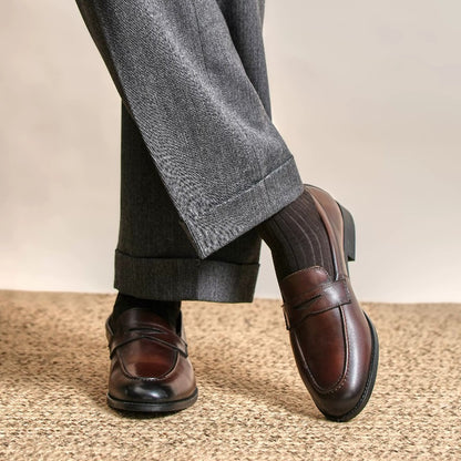 Lunepebbla brown waxed calfskin penny loafers close-up showing burnished toe gradient