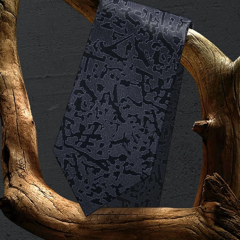 Lunepebbla abstract textured silk necktie draped showing tonal variation and woven depth