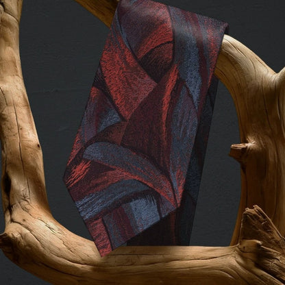 Lunepebbla abstract ribbon silk necktie draped showing abstract design and tonal depth