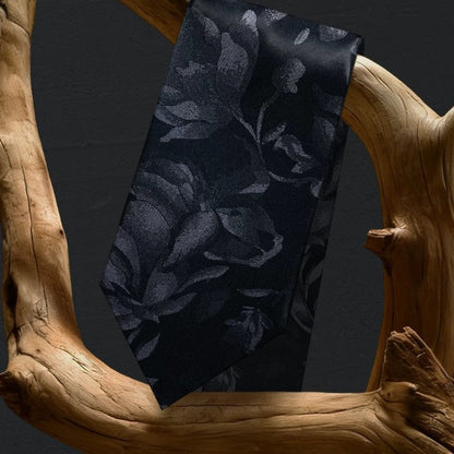 Lunepebbla tonal floral silk necktie draped showing tonal depth and understated texture