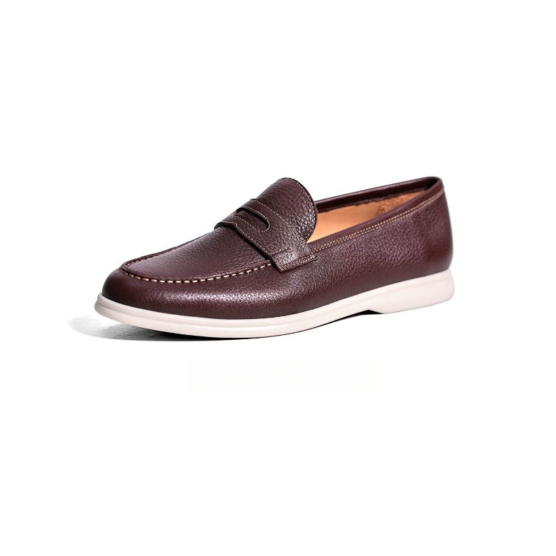 Lunepebbla brown pebble-grain penny loafers side view showing textured leather and white sole