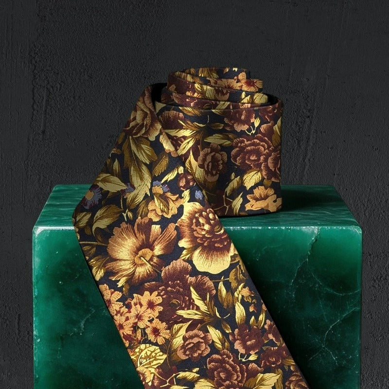 Lunepebbla baroque floral silk necktie rolled showing fabric weight and silk quality