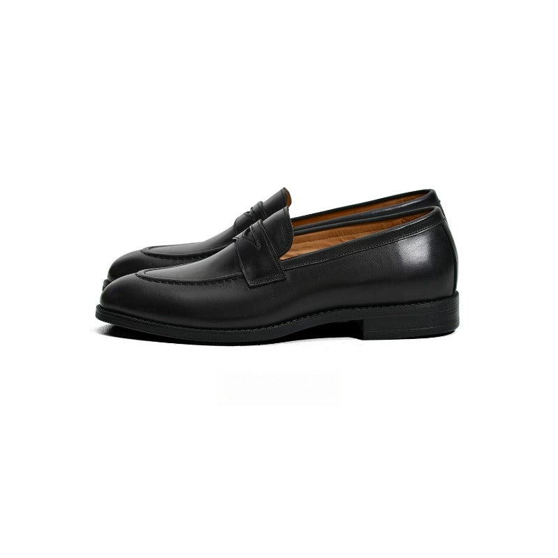 Lunepebbla black waxed calfskin penny loafers side view showing refined round toe and apron stitch