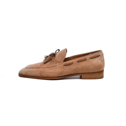 Lunepebbla sand suede tassel loafers side view showing contrast tassels and Blake-stitched sole