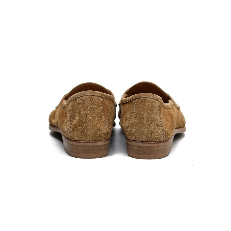 Lunepebbla tan suede penny loafers worn with white linen trousers showing soft drape on foot