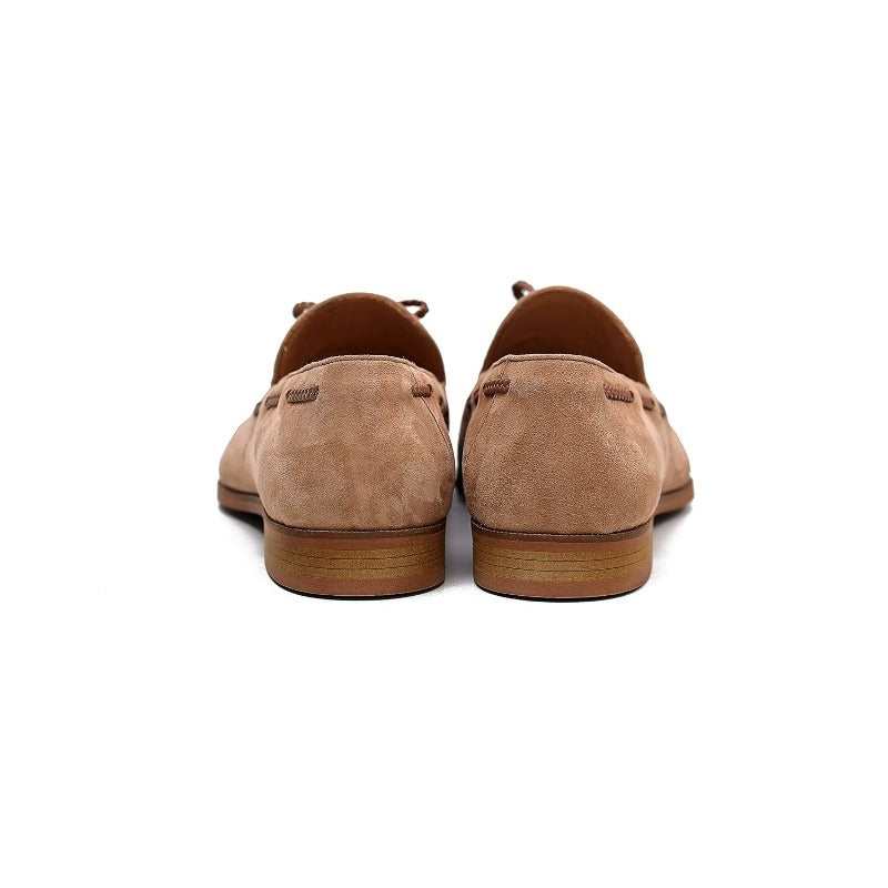 Lunepebbla sand suede tassel loafers worn with white trousers showing contrast tassels on foot