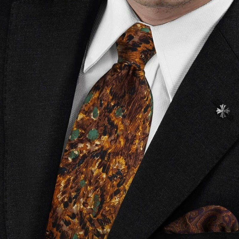 Italian Renaissance floral silk necktie worn with white dress shirt and dark suit, amber gold teal oil painting pattern at chest