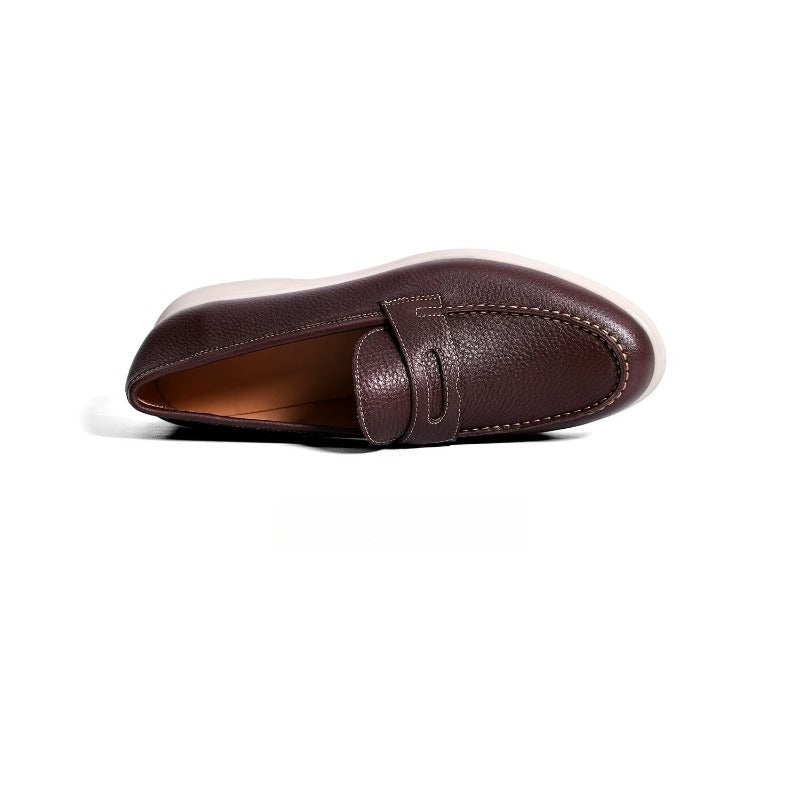 Lunepebbla pebble-grain penny loafers sole view showing white rubber outsole anti-slip tread