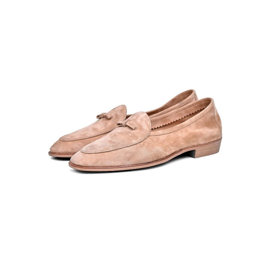 Lunepebbla sand suede tassel loafers worn with white trousers showing Mediterranean styling