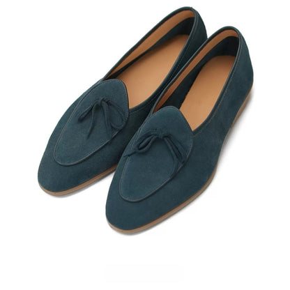Lunepebbla camel suede Belgian loafers worn with light trousers showing relaxed fit on foot
