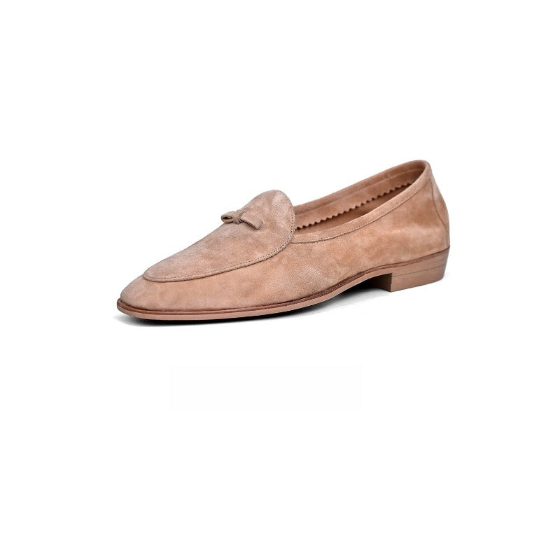 Lunepebbla sand suede tassel loafers close-up showing contrast tassels and suede nap texture