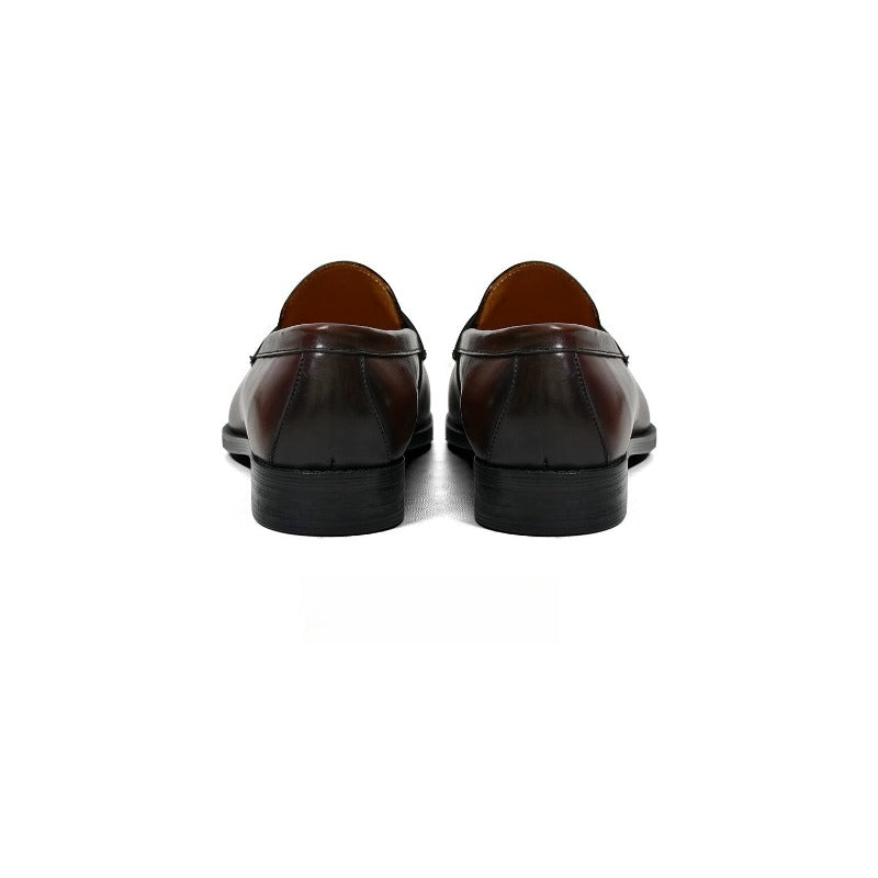 Lunepebbla waxed calfskin penny loafers worn with grey trousers showing refined round toe