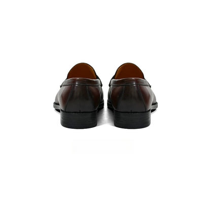 Lunepebbla waxed calfskin penny loafers worn with grey trousers showing refined round toe