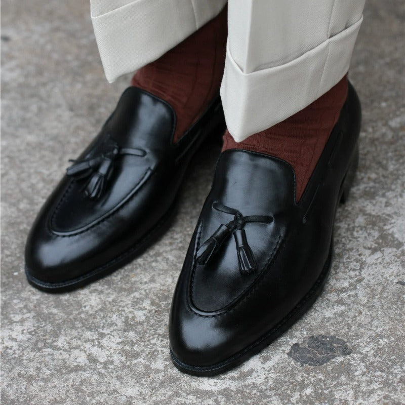 Lunepebbla handmade black full-grain leather tassel loafers with twin tassels and caramel lining