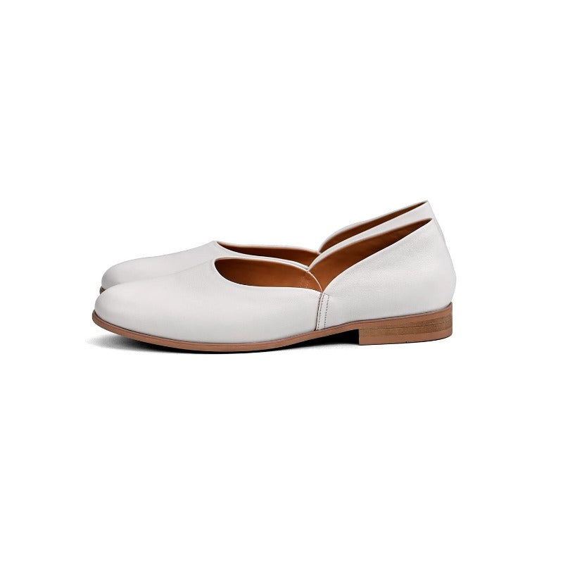 Lunepebbla black leather pointed-toe loafers close-up showing leather grain and stitching